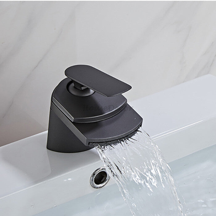 Black bath shower mixer tap waterfall spout detail view