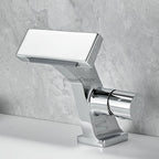 Brass bathroom basin mixer tap waterfall spout detail view