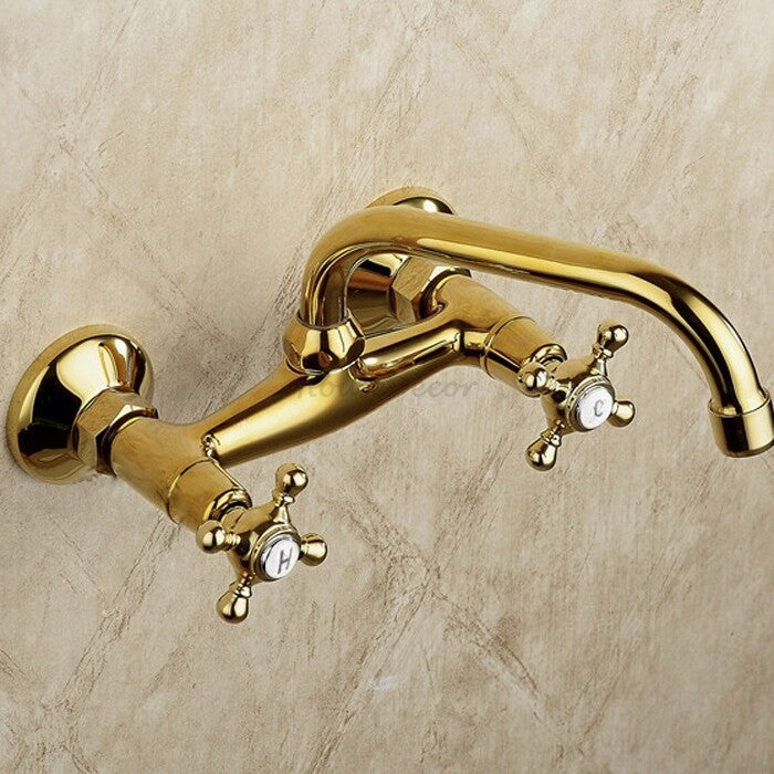 Gold kitchen sink mixer tap dual handle control detail view