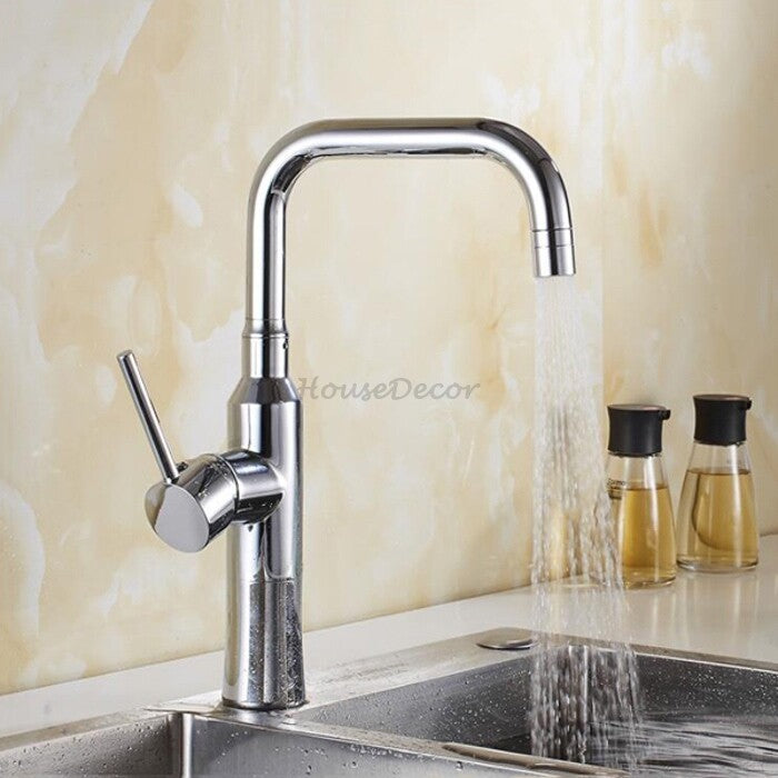 Modern kitchen sink mixer tap swivel spout detail view