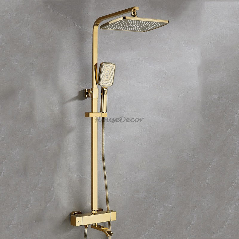 Gold bath shower mixer tap thermostatic control detail view