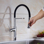 Modern kitchen sink mixer tap swivel spout detail view