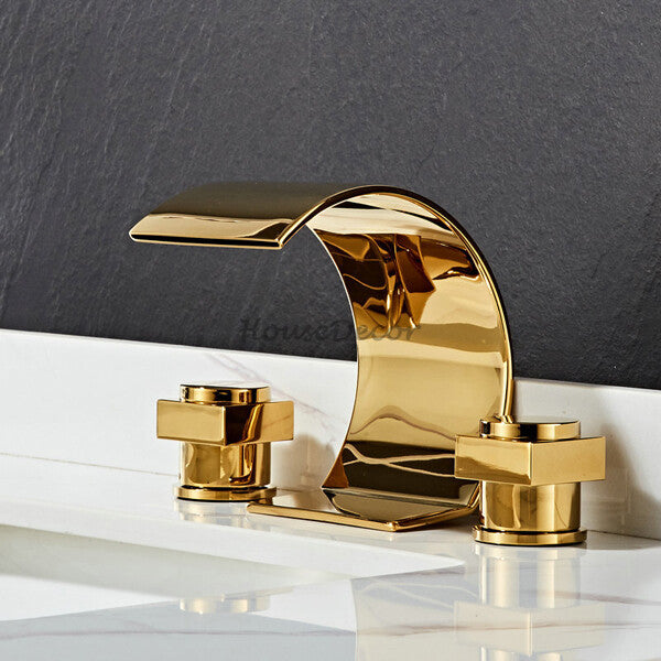 Gold bath shower mixer tap waterfall spout detail view