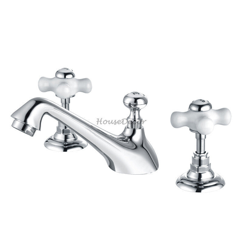 Brass bathroom basin mixer tap dual handle control detail view