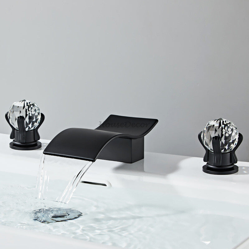 Modern bathroom basin mixer tap waterfall spout detail view