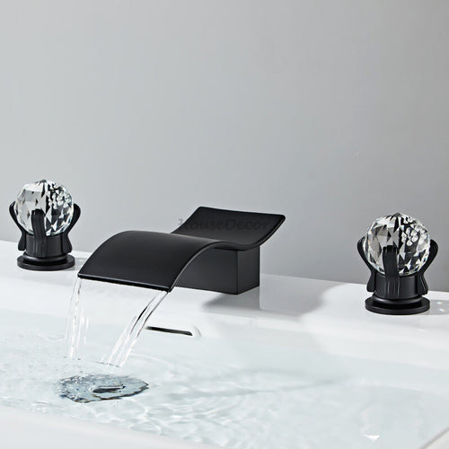 Modern bathroom basin mixer tap waterfall spout detail view