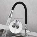 Modern kitchen sink mixer tap swivel spout detail view