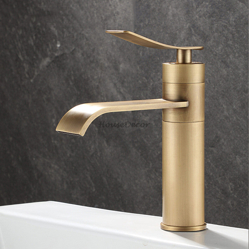 Modern Brass bath shower mixer tap waterfall spout detail view