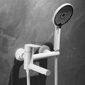 White bath shower mixer tap swivel spout detail view