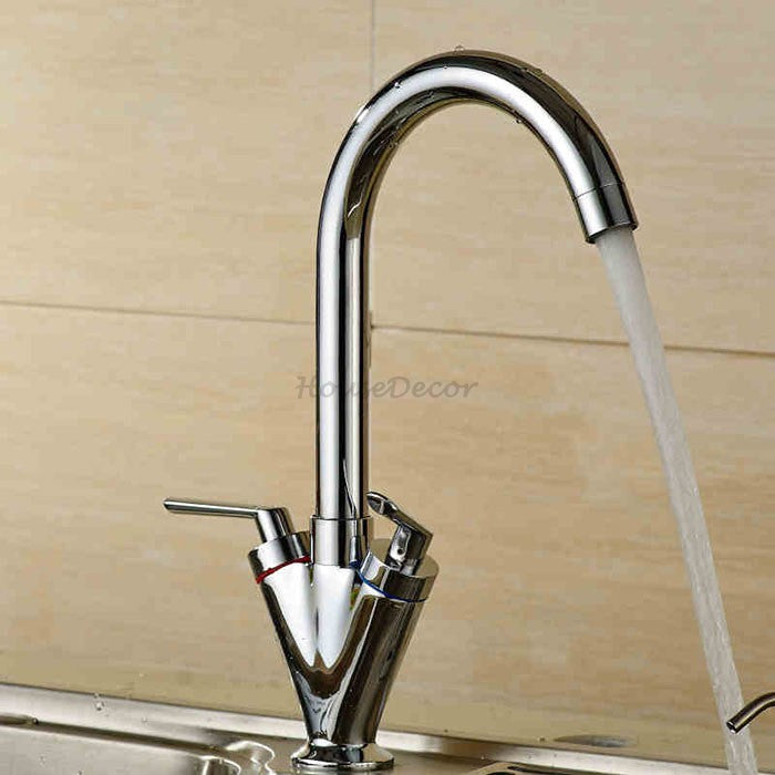 Chrome kitchen sink mixer tap swivel spout detail view
