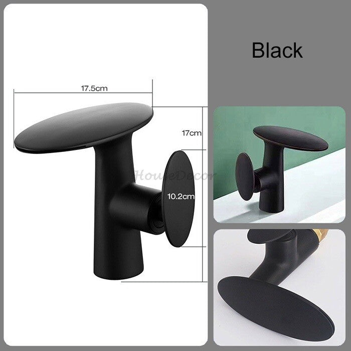 Modern bathroom basin mixer tap waterfall spout detail view