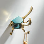 Gold robe hook swivel spout detail view
