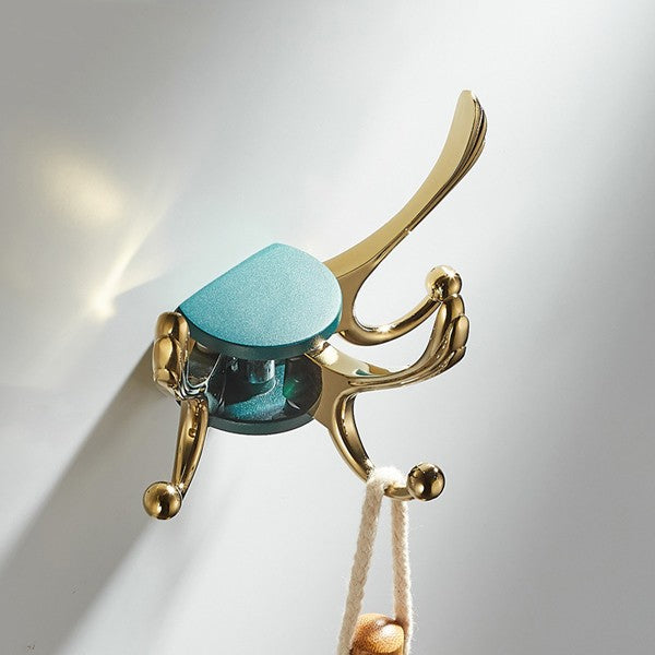 Gold robe hook swivel spout detail view
